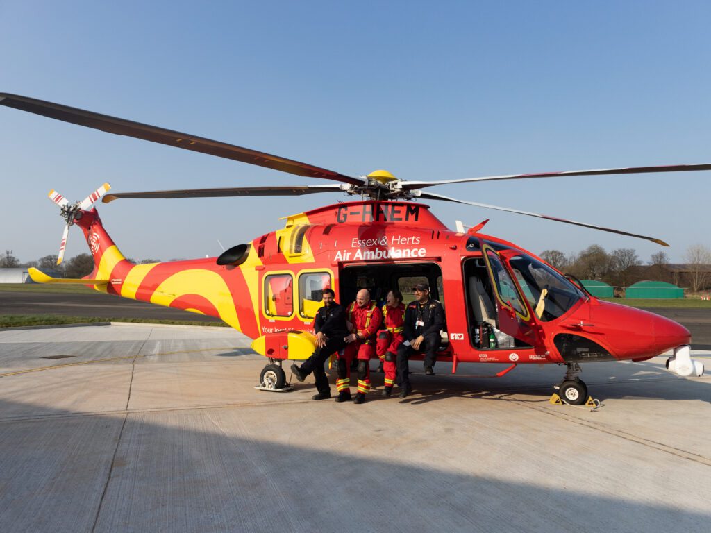 Pilots, Doctors and Paramedics sat on the edge of the AW169