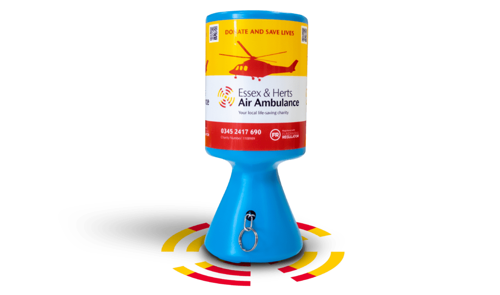 A blue community tin wrapped in red and yellow EHAAT branding, sitting on a rotor graphic