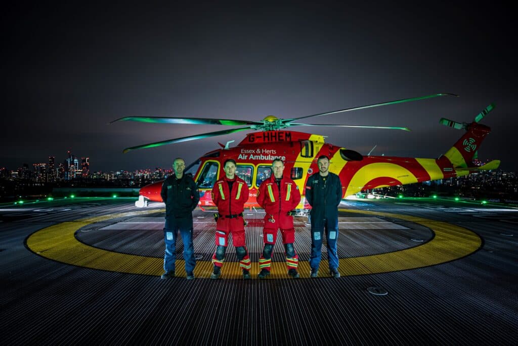 Pilot, Co-Pilot, Paramedic and Doctor night flying at holiday hospital