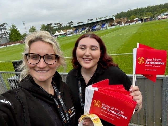 Jess Clark and Charlotte Evans at football game in support of EHAAT